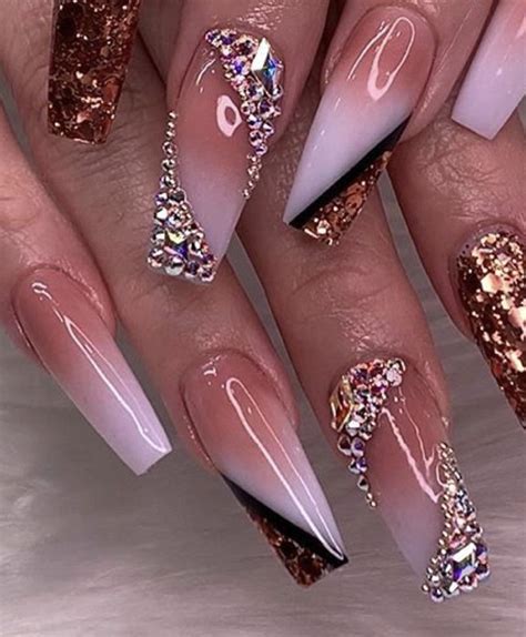 Simple and short yet super chic! And just like the phenomenal brand, this light-pink set with black and gold Louis Vuitton <strong>nail</strong> art will be a timeless favorite. . Fancy nail ideas